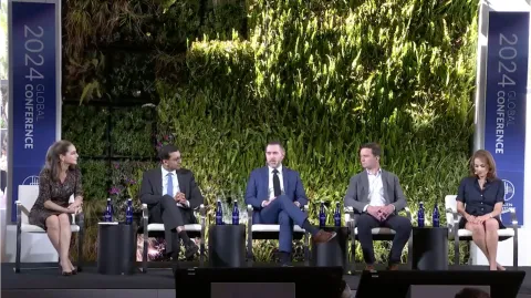 Image of panel on a stage during an event